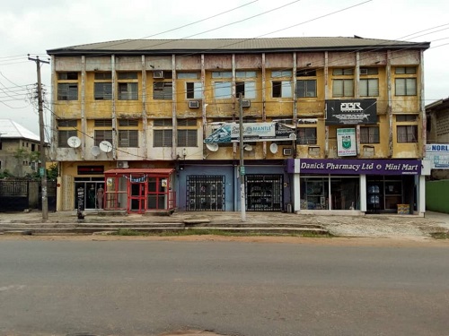 2 story building along ikenegbu after johnny supermarket  owerri imo state for sale