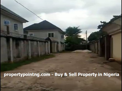 top real estate agent A piece of Land measuring 421 SQ Meters with fence and gate at Works Layout, Owerri