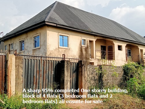 top real estate agent A sharp 95% completed One storey building, block of 4 flats 3 bedroom flats and 2 bedroom flats all ensuite for sale